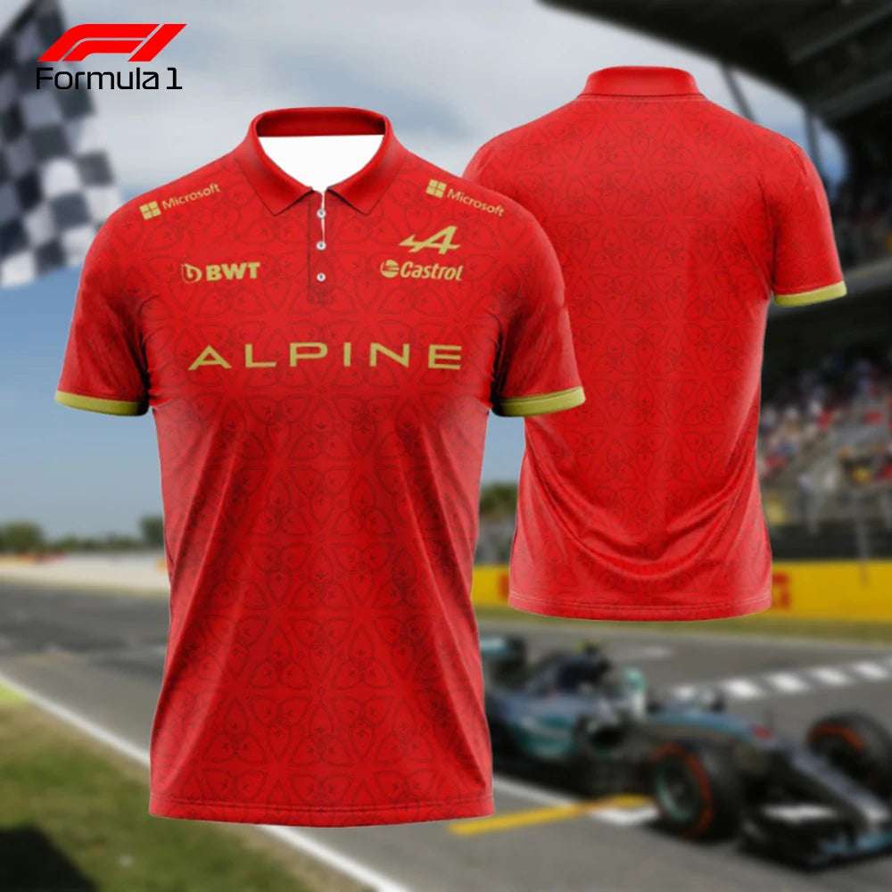 Red Formula 1 Alpine polo shirt with sponsor logos and gold accents on sleeves and collar
