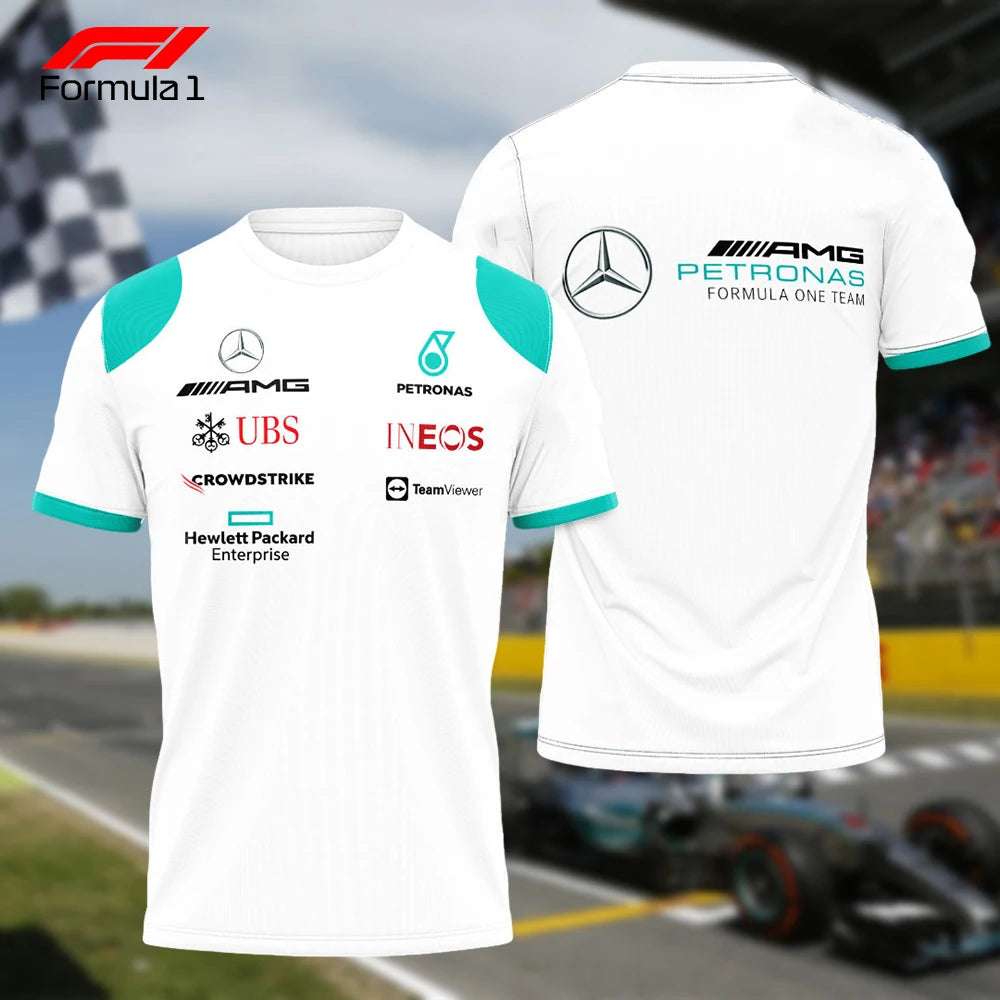 White Mercedes AMG F1 Team shirt with sponsor logos and turquoise accents on a racing track background