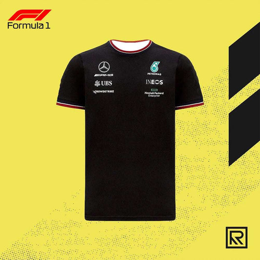 Black Formula 1 racing team shirt with sponsor logos on front and red white trim on collar and sleeves