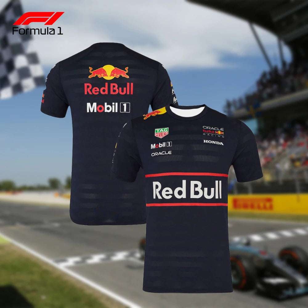 Front and back view of Red Bull F1 team shirt with sponsor logos on race track background